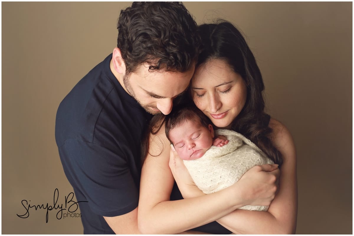 edmonton newborn photographer with parents