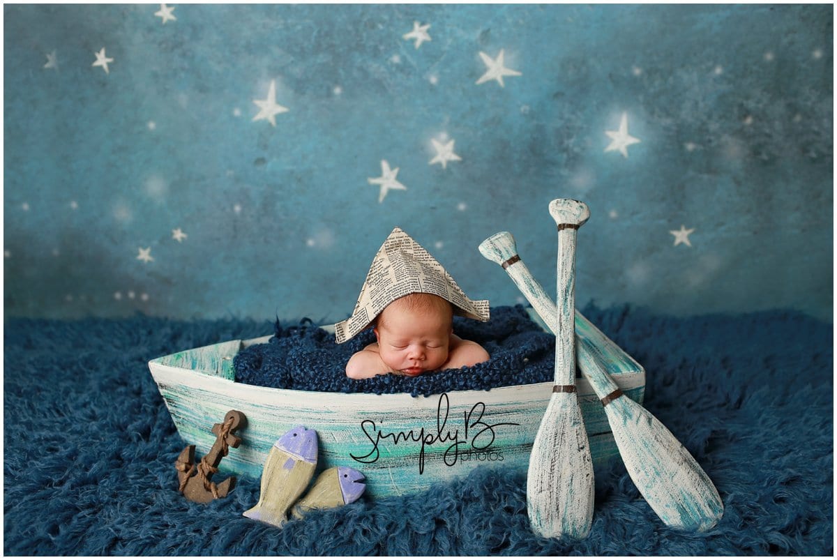 edmonton newborn photographer baby boy boat fishing theme props