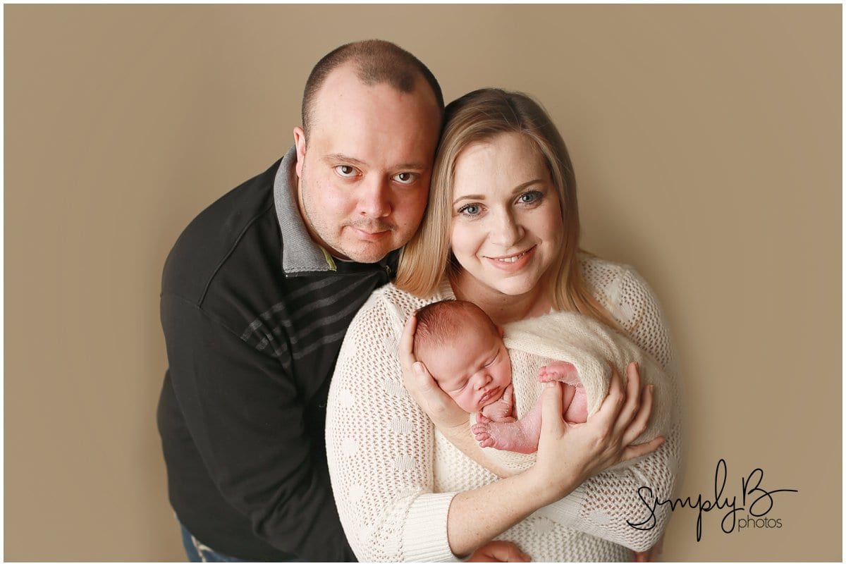 edmonton newborn photographer baby boy with family poses