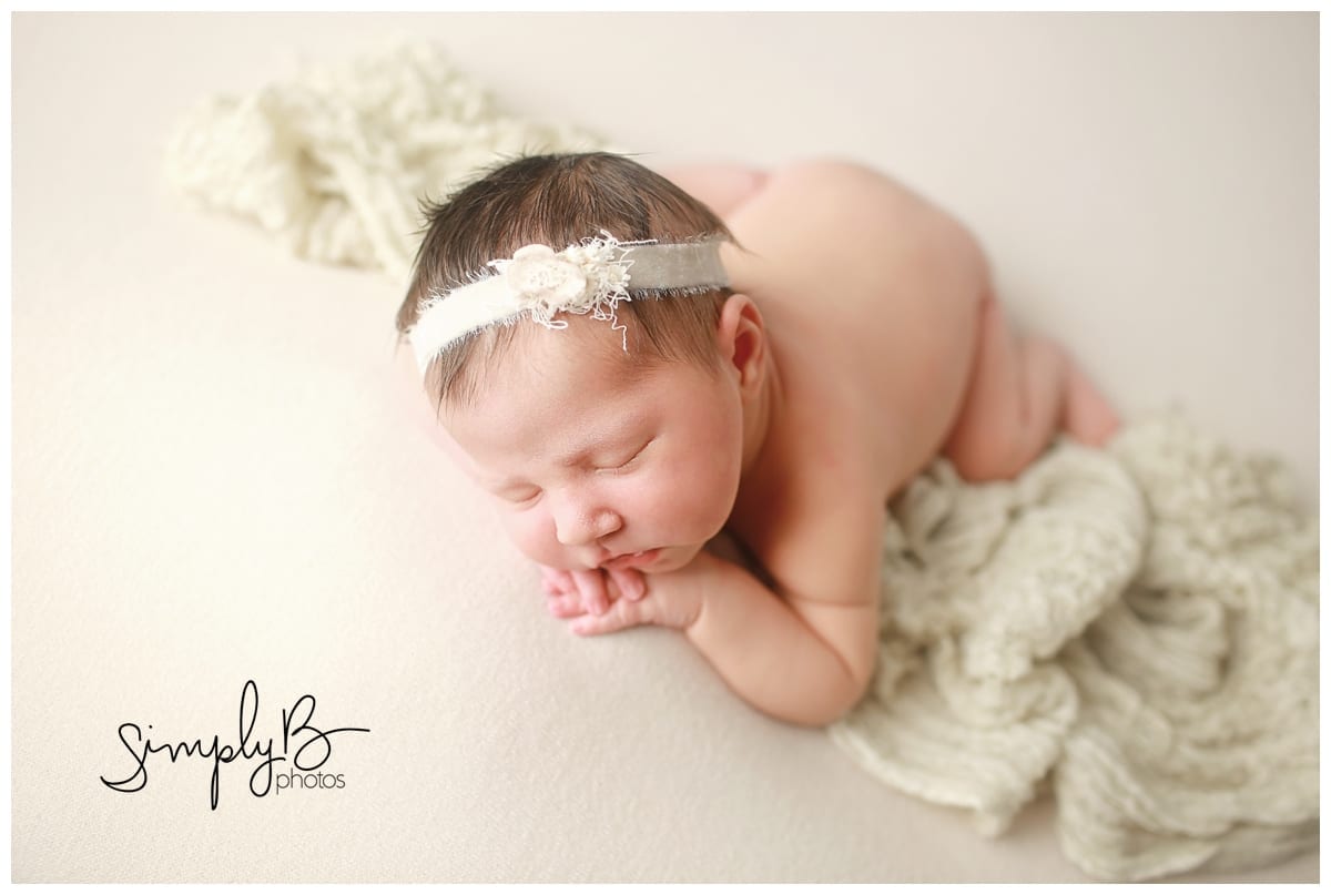 edmonton newborn photographer baby girl little bed