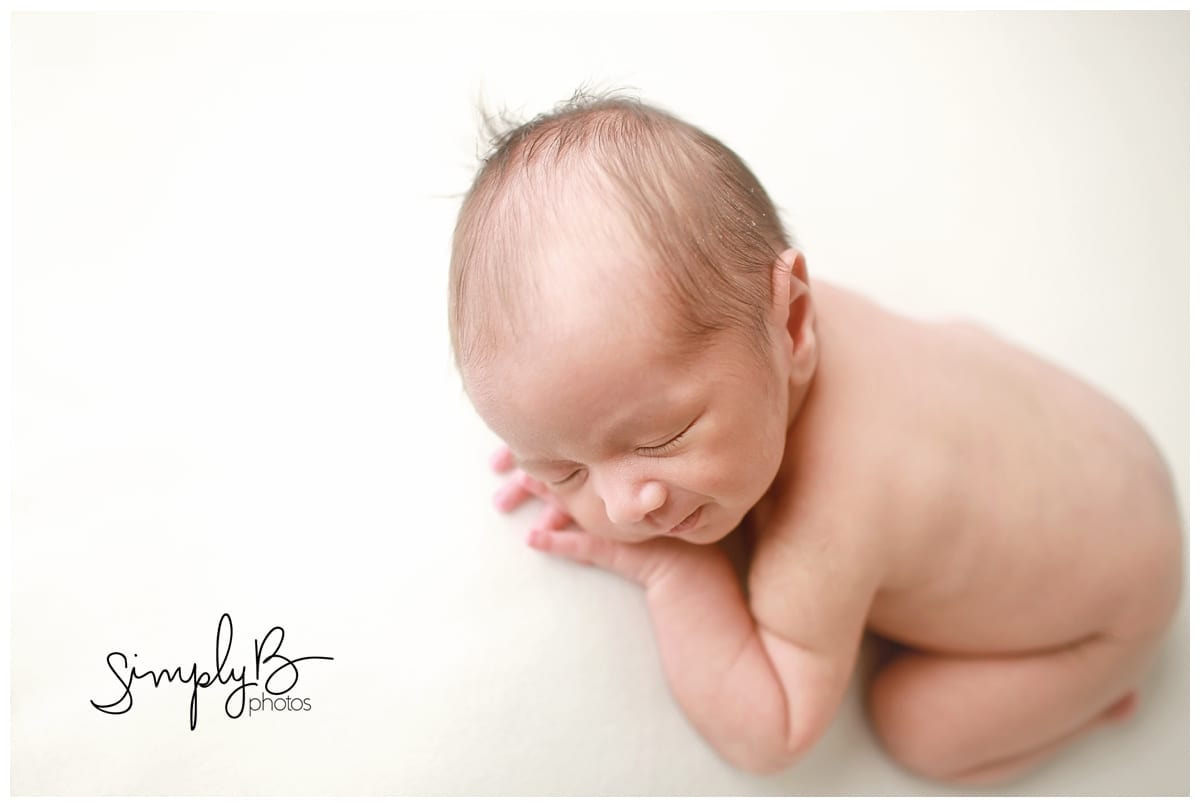 edmonton newborn photographer natural poses